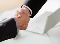 shows two people shaking hands